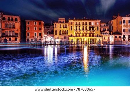 Grand canal at Venice by night with the lights of the river shuttles