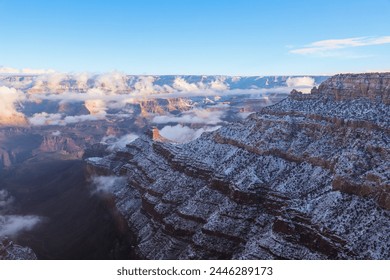 Grand Canyon Arizona, Winter Scene at the Grand Canyon, Inversion Clouds, Snow Capped Red Rock, AZ, National Parks, Wonders of the World, USA Tourism, Adventure Travel - Powered by Shutterstock