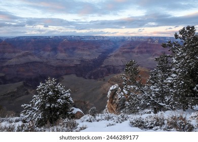 Grand Canyon Arizona, Winter Scene at the Grand Canyon, Inversion Clouds, Snow Capped Red Rock, AZ, National Parks, Wonders of the World, USA Tourism, Adventure Travel - Powered by Shutterstock