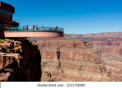 Grand Canyon National Park, West Rim, Arizona, USA. Layered bands of red rock revealing millions of years of geological history. Skywalk is a horseshoe-shaped cantilever bridge with a glass walkway.