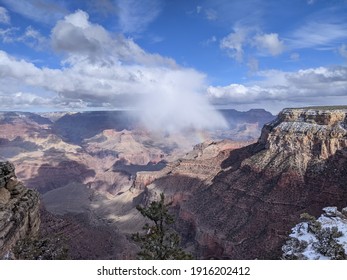 Grand Canyon with rainbow in sky