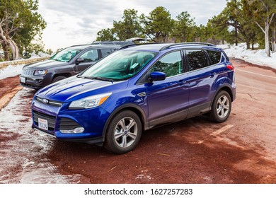 Grand Canyon Village, AZ, USA - January 2020 : Visitors Vehicles Parked On The Grand Canyon Car Park During Winter With Snow