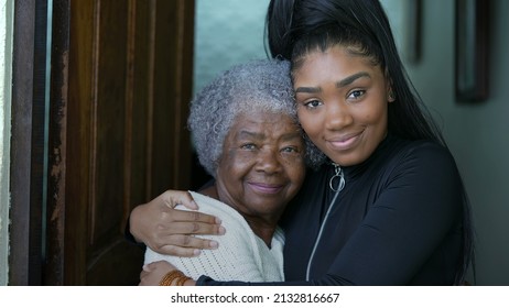 Grand Daughter Embracing Senior Grandmother Authentic Family Love And Embrace