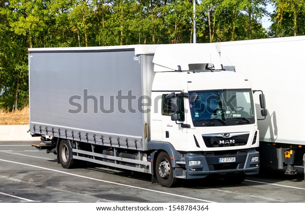 Grand Est, France - September 16, 2019:\
Cargo truck MAN TGM 18.250 at the interurban\
road.
