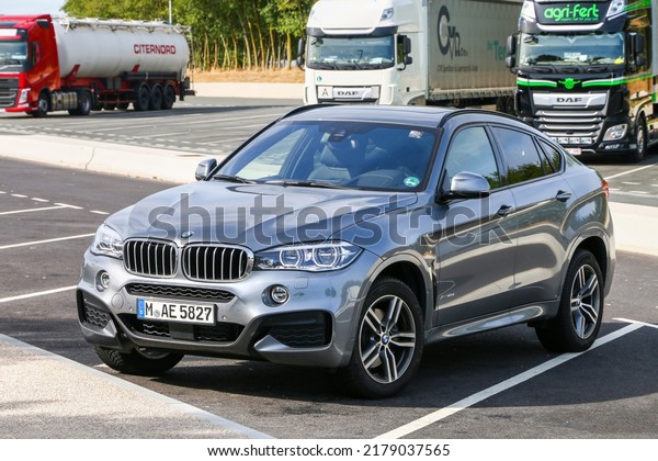 Grand Est, France - September\
16, 2019: Luxury German crossover BMW X6 (F16) at an intercity\
road.