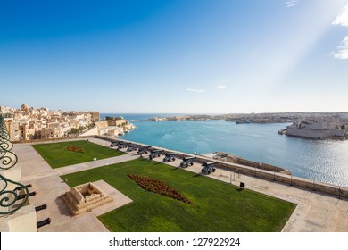 The Grand Harbour of Valletta and Saluting Battery. View from Upper Barracca gardens, Valletta, Malta