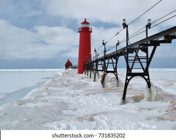 Grand Haven Lighthouse And A Frozen Lake Michigan In Winter