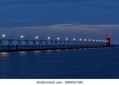 Grand Haven Lighthouse and pier at dusk Grand Haven, Michigan