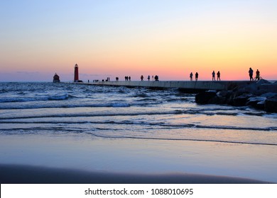 Grand Haven Michigan pier at sunset.