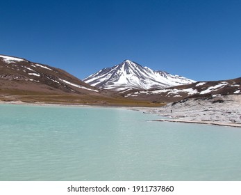 The Grand And Imposing Miñiques Volcano, In Água Calientes And Piedras Rojas In The Atacama Desert In Chile.                               