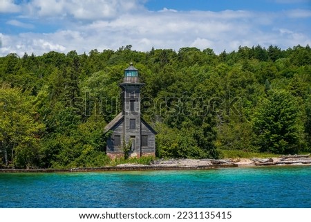 The Grand Island East Channel Light is a lighthouse located just north of Munising, Michigan. Constructed of wood, the light first opened for service in 1868