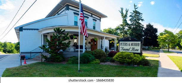 Grand Ledge, MI - JULY 12: Panoramic View Of The Exterior Of Peters And Murray's Funeral Home In The City Of Grand Ledge, MI On July 12, 2020.