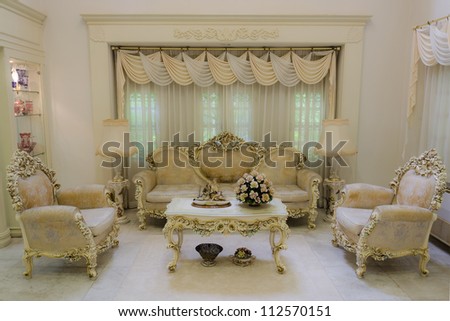 A grand living room interior architecture with various furniture in a residential house home with a luxurious and classical retro of European royal palace style. 