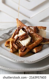 Grand Marnier And Brie French Toast With Syrup And Candied Pecans