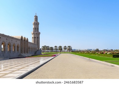 The Grand Mosque, a symphony of stone and spirituality under the azure sky. - Powered by Shutterstock