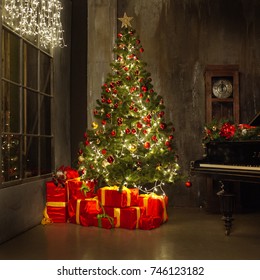 Grand Piano With Christmas Tree & Presents In Background. Fireplace Lights, Decorated Xmas House