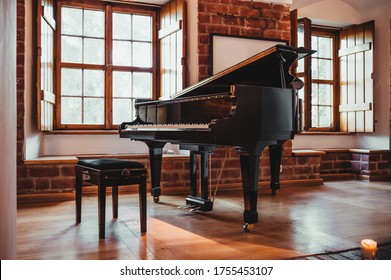 Grand piano in a rustic room