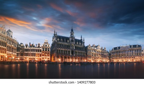 Grand Place square in Brussels with night lighting, illuminated facades, Belgium. The main attraction of Brussels at night. Brussels Town Hall, City Museum