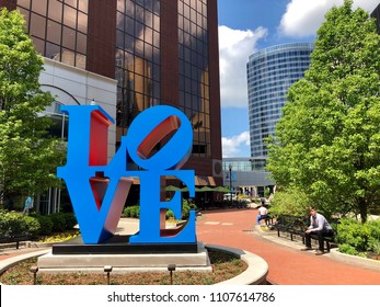 GRAND RAPIDS, MI - MAY 16, 2018: Iconic pop art blue LOVE sculpture in downtown Grand Rapids. It consists of the letters LO over the letters VE and is 8 foot wide 8 foot tall and 4 feet deep. 