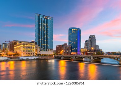Grand Rapids, Michigan, USA downtown skyline on the Grand River at dusk. - Shutterstock ID 1226085961