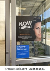 Grand Rapids, Minnesota, USA - July 30, 2022: Walmart advertises that they are hiring workers. 4081