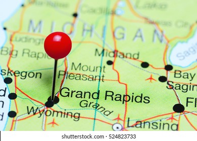 Grand Rapids pinned on a map of Michigan, USA
