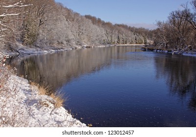 The Grand River With Snow Covering The Banks.  Shot In Kitchener, Ontario, Canada.