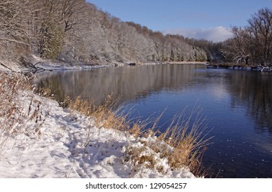 The Grand River With Snow Covering The Banks.  Shot In Kitchener, Ontario, Canada.