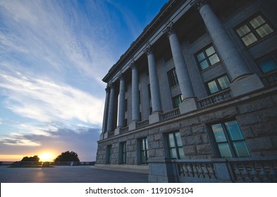 The Grand Side View Of The West Wing Of The Utah State Capitol In The Setting Sun. 