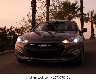 Grand Terrace, CA. 10-08-2020. Genesis 3.8 Coupe Parked On The Street Sunset.