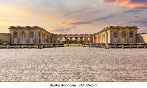 Grand Trianon palace in Versailles park outside Paris at sunset, France
