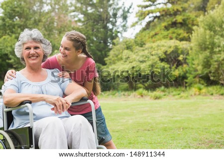 Similar – Senior woman in a wheelchair with her daughter