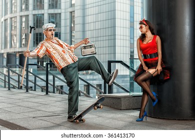 Grandfather Drops To Skate. Old Man With A Cane Grandfather.