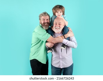 Grandfather Father And Son Grandson Hugging And Embracing. Fathers Day Concept. Men In Different Ages Cuddling Bonding. Parenthood With Grand Parent. Family Tenderness Hug, Child Love, Affectionate.