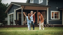 Grandfather And Grandmother Are Happy To Meet Their Granddaughter In Front Of Their Suburbs House. Grandparents Spending The Weekend With Kids, Enjoying Family Time With Grandchild.