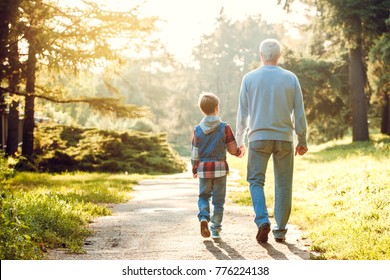 Grandfather and grandson together outdoors family concept - Powered by Shutterstock