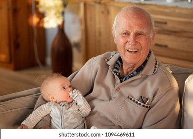 Grandfather Holding Baby
