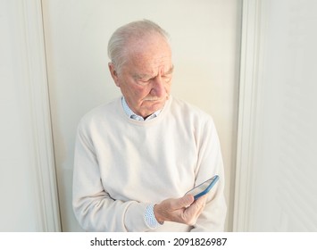 Grandfather Making A Face Time Call