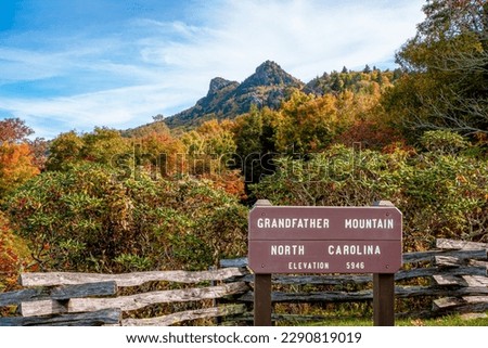 Grandfather Mountain State park in fall season. Grandfather Mountain is a mountain near Linville, North Carolina. At 5,946 feet, it is the highest peak on the eastern of the Blue Ridge Mountains.