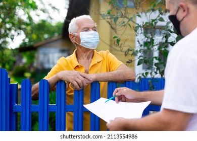 Grandfather In Protective Mask Talking To Census