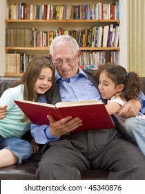grandfather reading a story to his grandchild