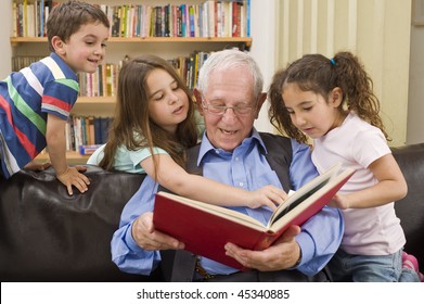 Grandfather Reading A Story To His Grandchild