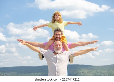 Grandfather With Son And Grandson Having Fun, Raising Hands Or Open Arms Flying On Sky. Start, Creativity Startup Concept.