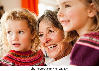 Grandma And Grandchildren Smiling