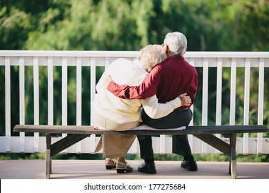 Grandma And Grandpa Sitting On Porch