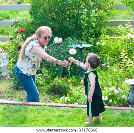 Similar – junge wirft einen Ball auf die Oma