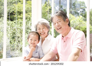 A Grandma Holding Her Grandson