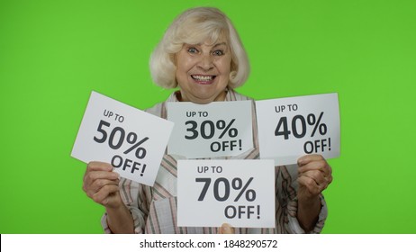 Grandma Showing Sale Percent Discounts Advertisement Inscriptions Banners. Grandmother Rejoicing Good Discounts, Low Prices For Online Shopping Sales. Black Friday Concept. Chroma Key