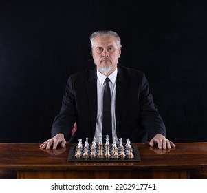 Grandmaster In A Suit Playing Chess