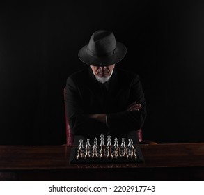 Grandmaster In A Suit Playing Chess